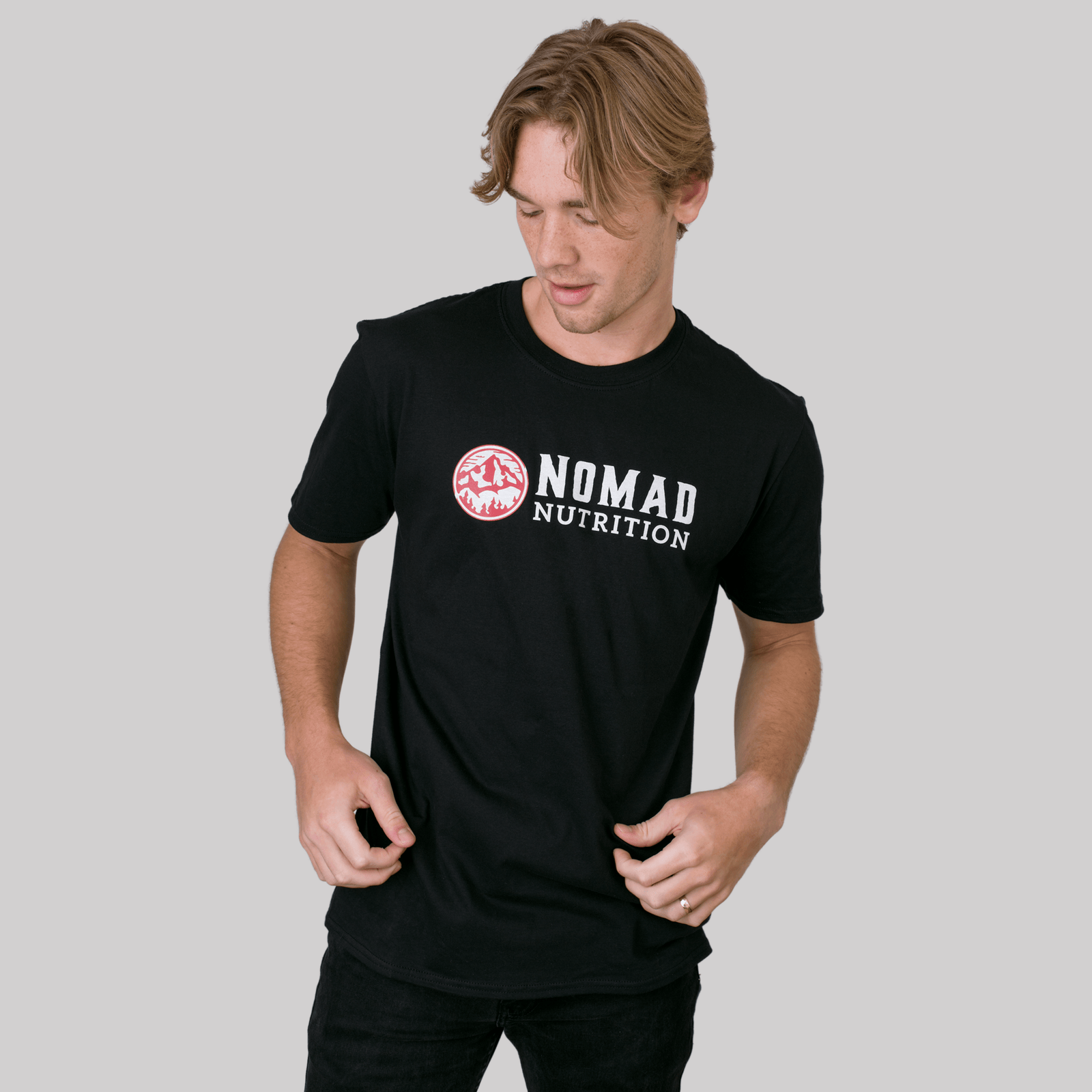 Nomad Nutrition Shadow T-shirt male model wearing large.