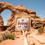 Nomad Nutrition Hungarian Goulash, vegan dehydrated adventure, camping, plant-based, gluten-free meal picture at Double Arch Trail, Arches National Park.
